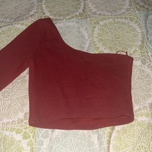 Crop top shirt with a half sleeve got it at pacsun very good condition.